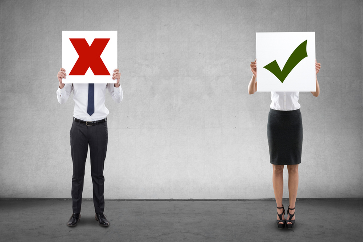 Business people holding tick and cross sign icon placards, decision making concept
